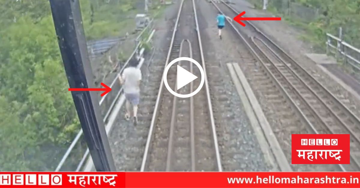 children crossing a railway track